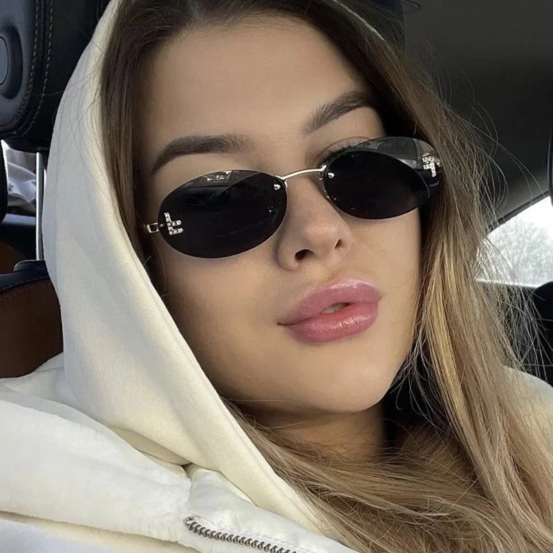 Unisex Retro Oval Rimless Sunglasses.