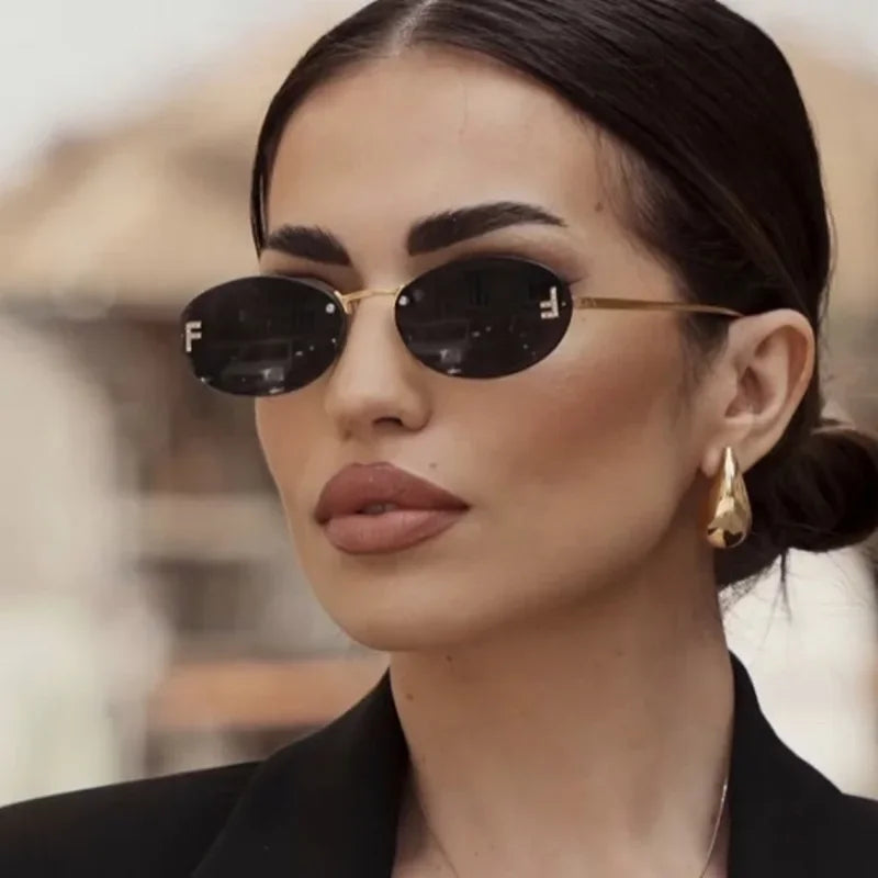 Unisex Retro Oval Rimless Sunglasses.