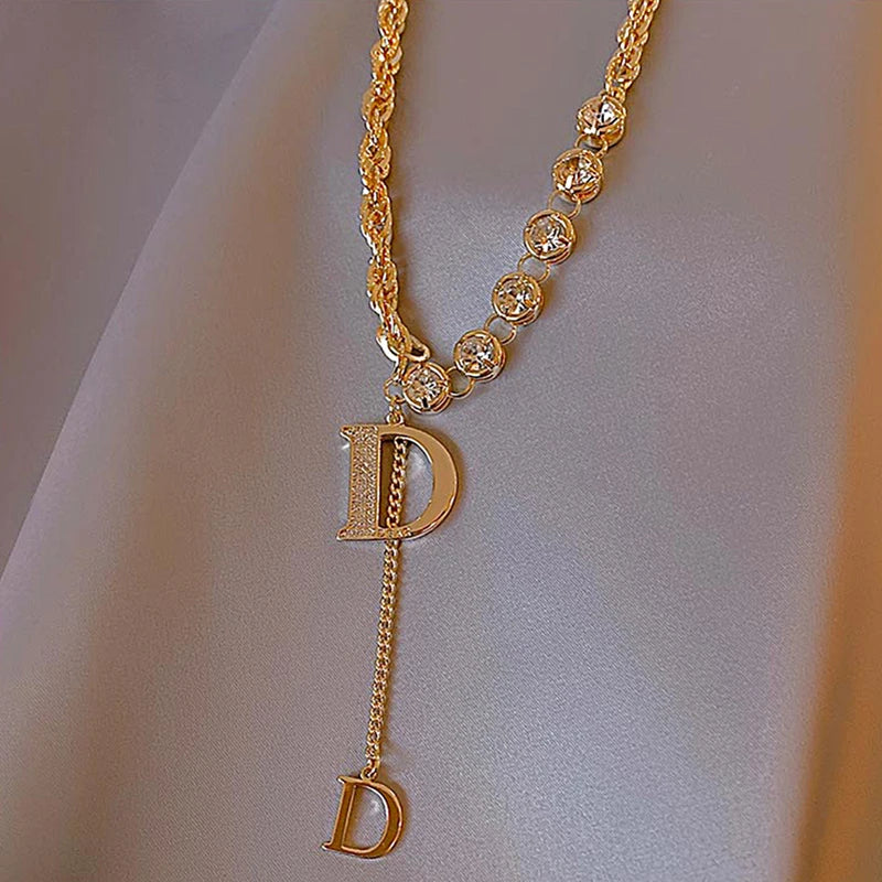 Gold Color Plated Necklace with classic D Letter Pendant.
