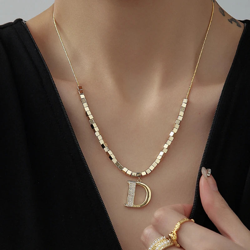 Gold Color Plated Necklace with classic D Letter Pendant.