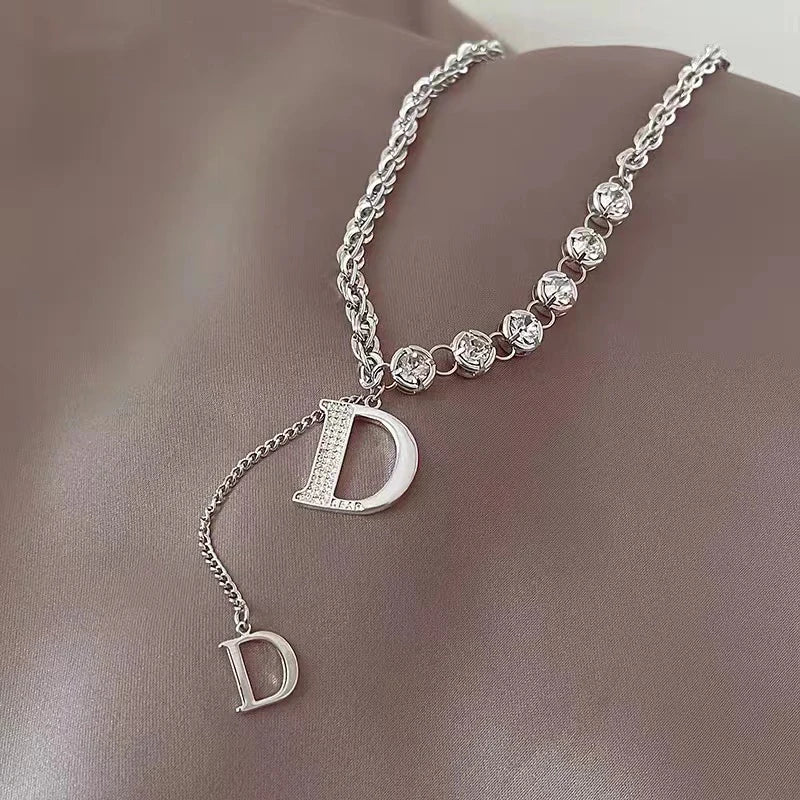 Gold Color Plated Necklace with classic D Letter Pendant.