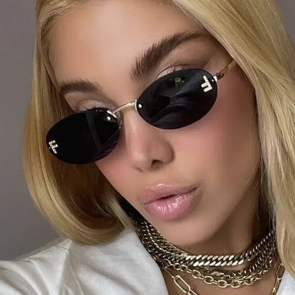 Unisex Retro Oval Rimless Sunglasses.