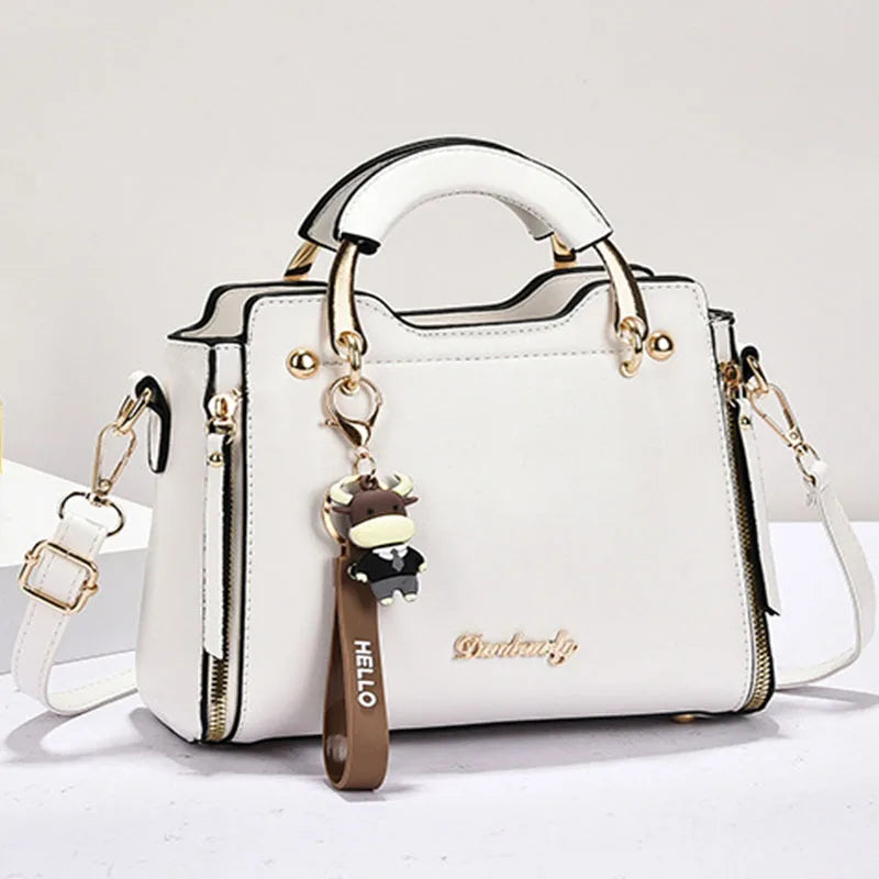 Printed monogram straddle leather bag.