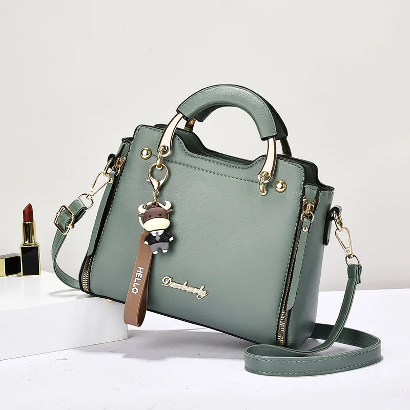 Printed monogram straddle leather bag.