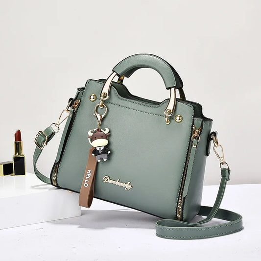 Printed monogram straddle leather bag.