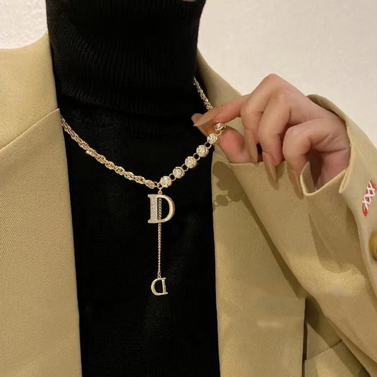 Gold Color Plated Necklace with classic D Letter Pendant.