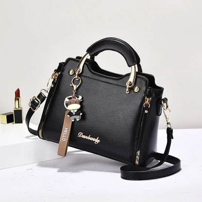 Printed monogram straddle leather bag.